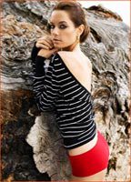 Джина Холден